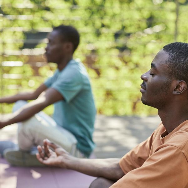 Close-up of a person practicing deep breathing exercises in a calm setting.